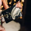 A.I. AFRICAN INTELLIGENCE SHARKS OF THE GOLD OCEAN CROSSOVER CLUTCH – SANDFLOWER COLLAB