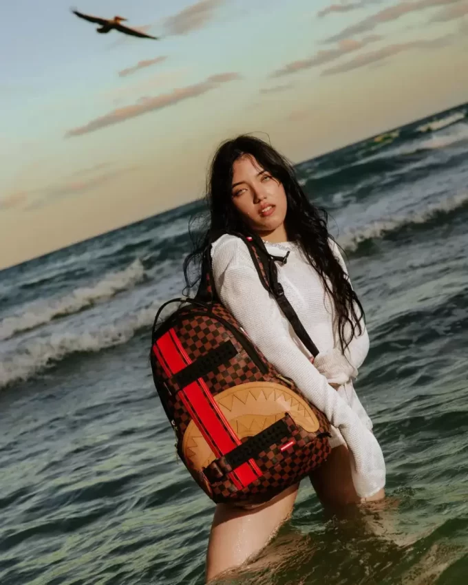 HENNY VICTORY LAP SKATEBOARD-STRAP BACKPACK