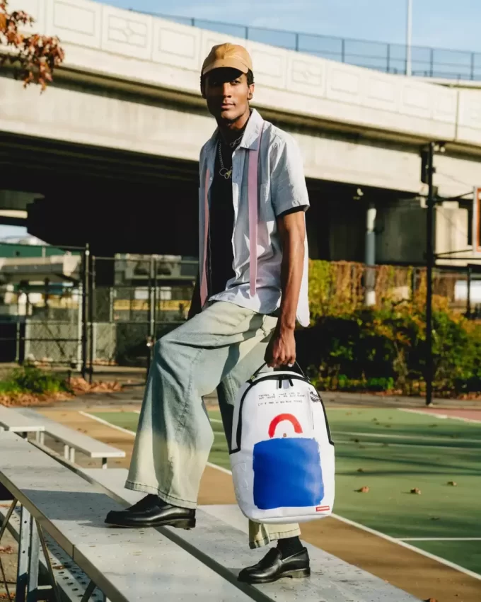 KEITH HARING BIG BLUE PURSE ART BACKPACK